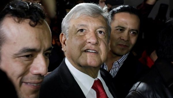 Andres Manuel Lopez Obrador (AMLO) leaves after being sworn-in as presidential candidate of the National Regeneration Movement (Morena) during the party's convention at a hotel in Mexico City, Mexico February 18, 2018.