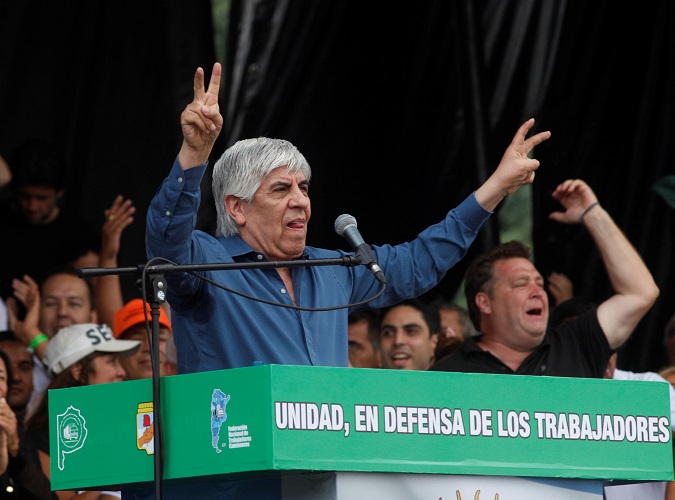 Hugo Moyano, head of the nation's main truckers' union speaks before the Buenos Aires demonstrators protesting the government's labor reforms. Moyano is being prosecuted for money laundering, which he denies, saying the accusations are a part of governmental persecution of opposition leaders. 