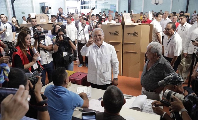 El Salvador's President Salvador Sanchez, from the leftist FMLN, casts his vote in the country's legislative election