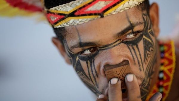 An indigenous man from the Pataxo tribe waits for a trial on the demarcation of Indigenous lands.