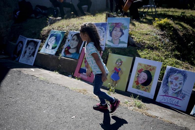 The victims of the terrible fire that destroyed the Virgen de la Asuncion group home last year were remembered by the ones they left behind as paintings of the girls were hung around the city.