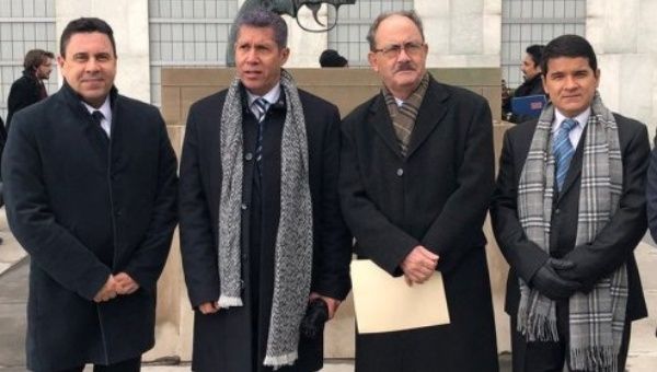 Venezuelan ambassador Samuel Moncada, left, with opposition presidential candidate Henri Falcon, second from left, following their meeting in New York on Tuesday.