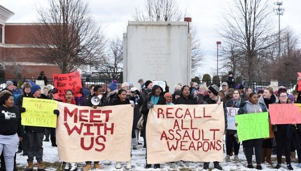 Students, teachers and faith leaders hold a rally in front of Smith & Wesson world headquarters in Springfield, Massachusetts, March 2018.