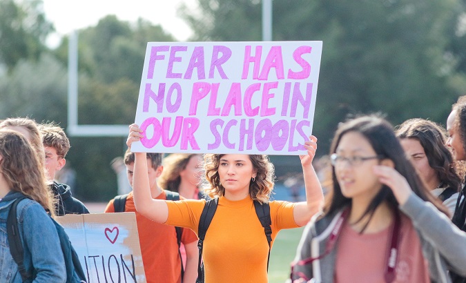 Students walk at a high school in California as part of a National School Walkout to honor the victims of the shooting at Marjory Stoneman Douglas High School.