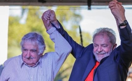 Former Uruguyan President Jose Mujica (L) and former Brazilian President Luiz Inacio Lula da Silva (R). 