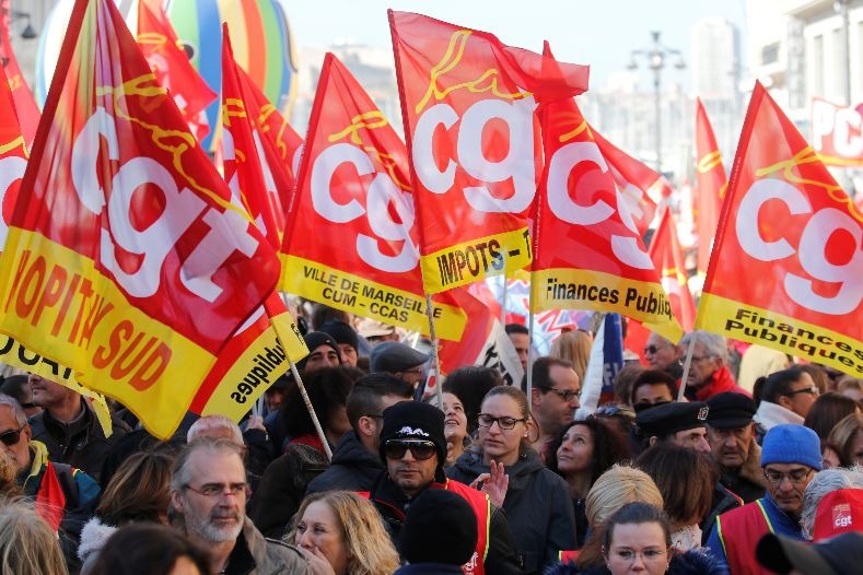 Protestors attend a demonstration during a national day of strike against reforms in Marseille, France.