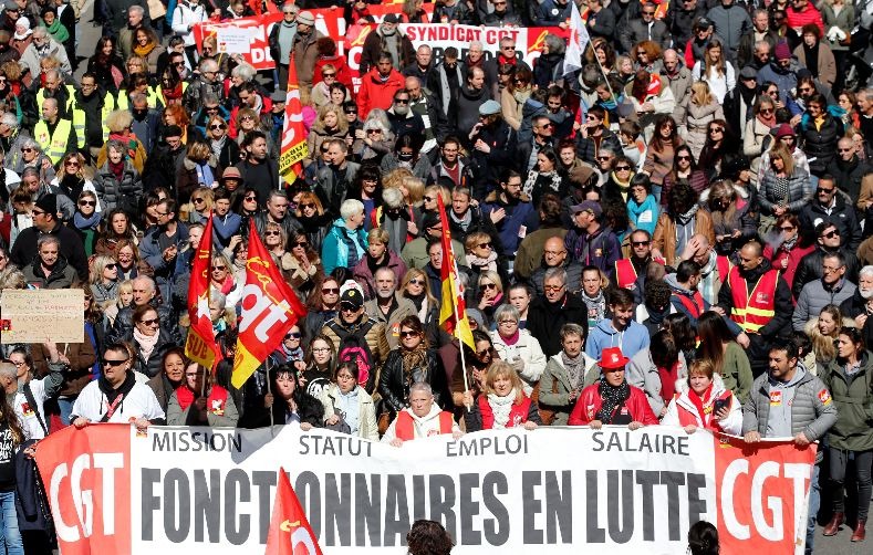 Protestors attend a demonstration during a national day of strike against reforms in Marseille, France.