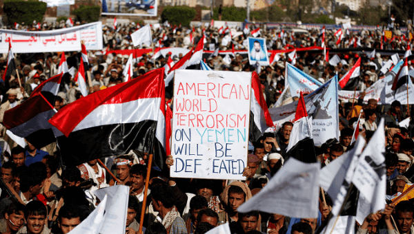 Houthi supporters attend a rally to mark the third anniversary of the Saudi-led intervention in the Yemeni conflict in Sanaa, Yemen March 26, 2018.