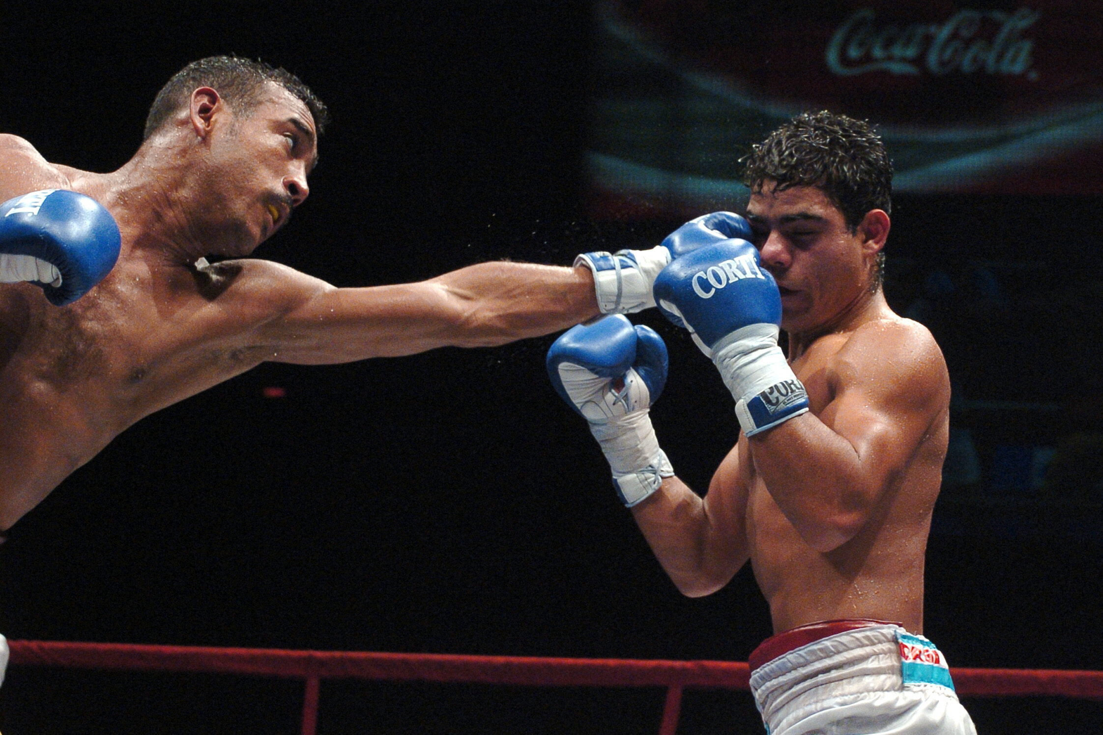 Venezuela's boxer Alexander Muñoz (left) fighting against Julio Ler (right) during a play-off fight in Luna Park, Buenos Aires, Argentina. May 26, 2005.