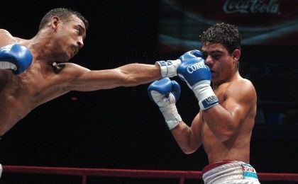 Venezuela's boxer Alexander Muñoz (left) fighting against Julio Ler (right) during a play-off fight in Luna Park, Buenos Aires, Argentina. May 26, 2005.