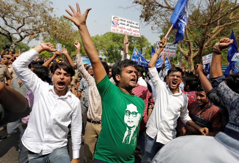 People belonging to the Dalit community shout slogans as they take part in a nationwide strike called by several Dalit organisations, in New Delhi, April 2, 2017.