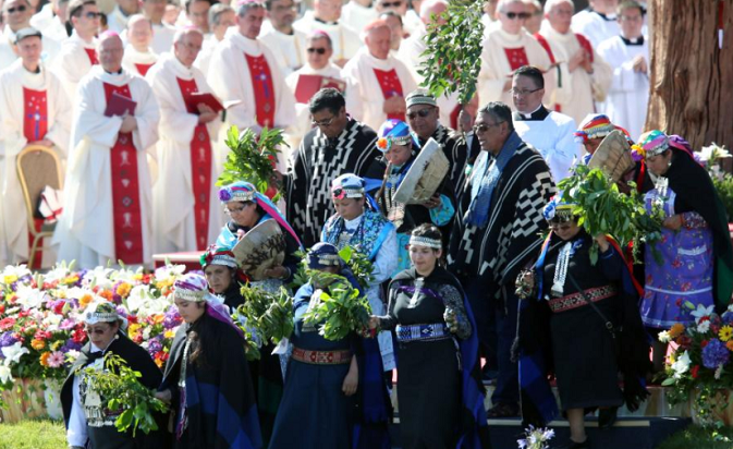 Indigenous Mapuche people take part in a mass led by Pope Francis at the Maquehue Temuco Air Force Base in Temuco, Chile, January 17, 2018.