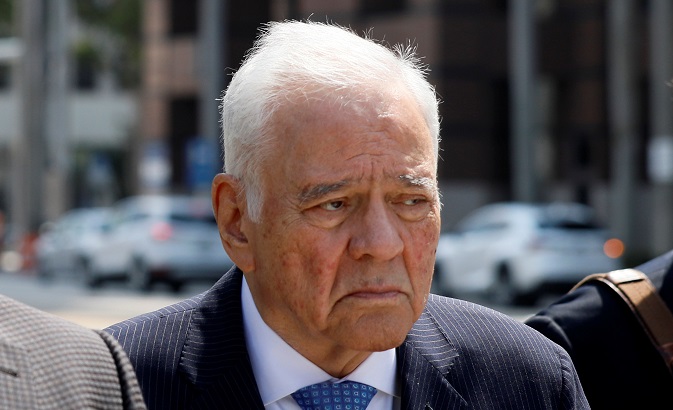 Bolivia's former President Gonzalo Sanchez de Lozada is seen as he leaves a federal courtroom in Fort Lauderdale in Florida, U.S., March 20, 2018