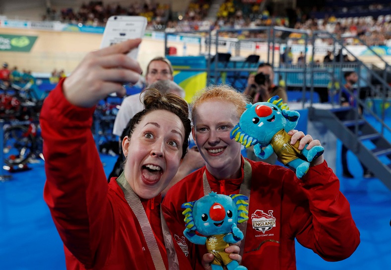 After one day of competition, England had already risen to the top of the tables with six gold medals. Australia was following close behind with five golds. Here, Sophie Thornhill and Helen Scott of England celebrate after winning the gold medal. 