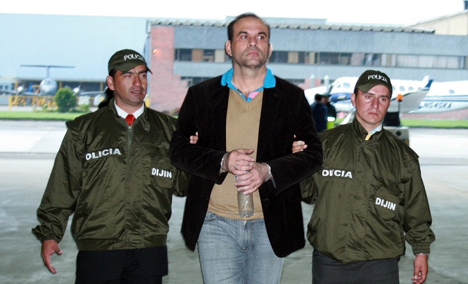Salvatore Mancuso being dragged away by members of Colombian Police in 2008