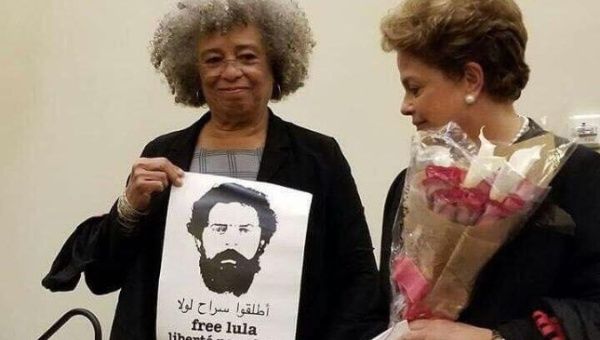 Angela Davis supports Lula's release from prison as she meets with former Brazilian President Dilma Rousseff.