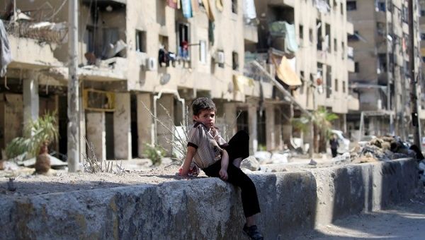 A child in Douma, outside Damascus, Syria.
