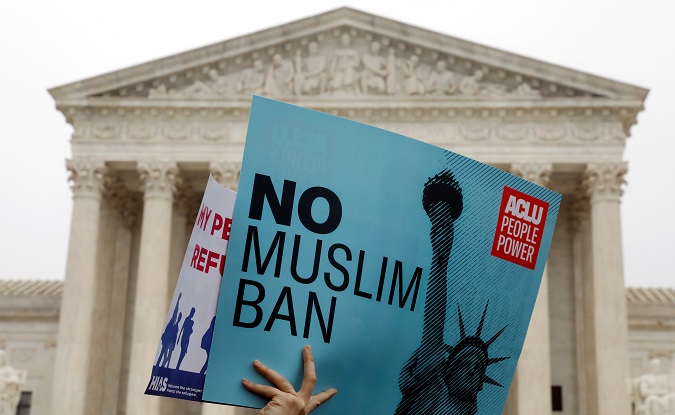 Protesters rally outside the U.S. Supreme Court in Washington, DC, U.S., April 25, 2018