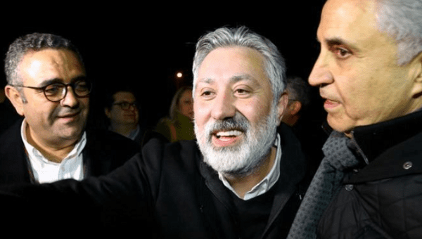 Murat Sabuncu, editor-in-chief of the newspaper Cumhuriyet, is greeted by his friends after being released from the prison in Silivri near Istanbul, Turkey March 10, 2018.
