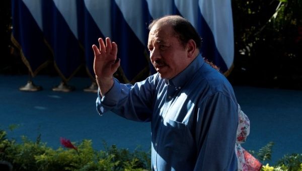 Nicaragua's President Daniel Ortega waves to supporters after voting in the municipal elections at a polling station in Managua, Nicaragua Nov. 5, 2017. 