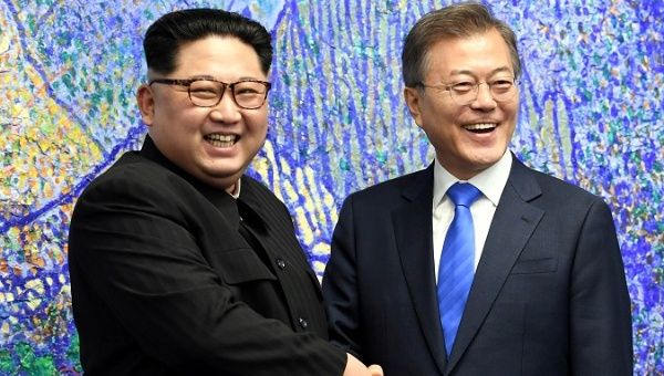 South Korean President Moon Jae-in shakes hands with North Korean leader Kim Jong Un at last week's historic summit.