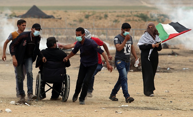 Protesters at Friday of Workers demonstrations along the Gaza-Israel border.