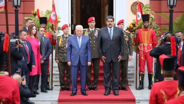 Palestinian President Mahmoud Abbas meets with Venezuelan President Nicolas Maduro at the Miraflores Palace in Caracas.