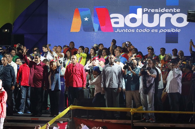 As results came out, Maduro supporters let off fireworks in poor Caracas neighborhoods and danced to Latin pop around the downtown Miraflores presidential palace.