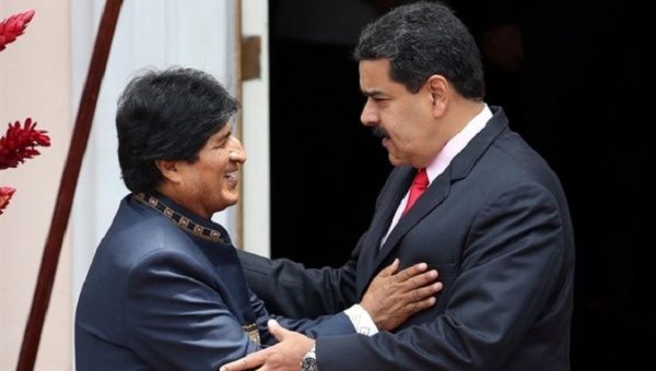 Bolivian President Evo Morales (L) with Venezuelan President Nicolas Maduro (R).