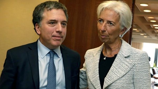 International Monetary Fund greets Argentina's Treasury Minister Nicolas Dujovne ahead of their meeting at the IMF on a new loan request in Washington.
