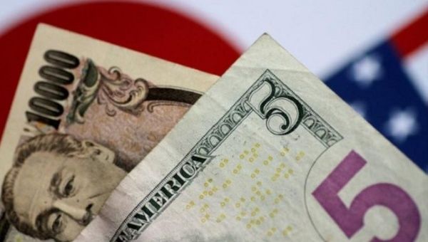 U.S. Dollar and Japan Yen notes are seen in this picture illustration June 2, 2017.