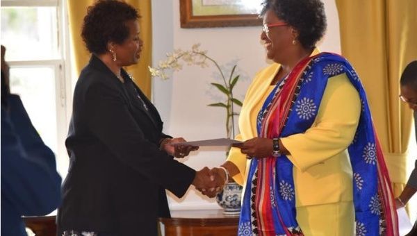 Mia Mottley (Right) Took the Oath of Office Before Governor General Dame Sandra Mason at Government House.