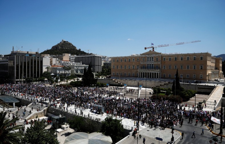 Over 10,000 striking workers, young people, and pensioners marched to the parliament in Athens, Greece Wednesday.