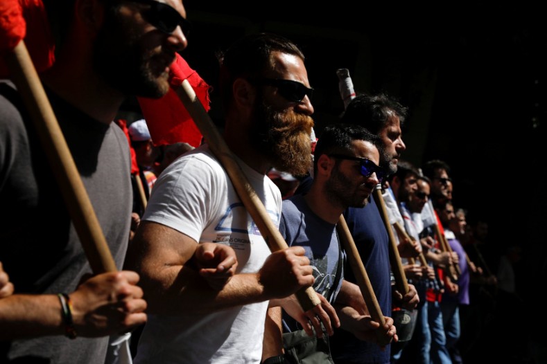 The demonstration marked a 24-hour general strike against planned austerity measures in Greece, grounding flights, docking ships and disrupting public transport.