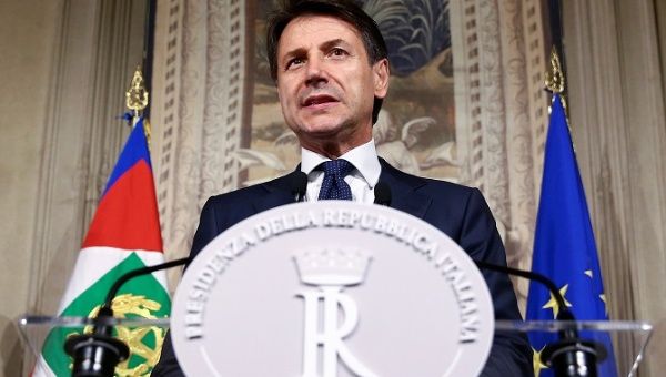Italy's Prime Minister-designate Giuseppe Conte talks to the media at the Quirinal Palace in Rome, Italy, May 31, 2018. 