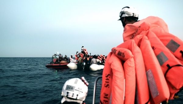 Migrants are rescued by staff members of the MV Aquarius, in the central Mediterranean Sea, June 9, 2018.