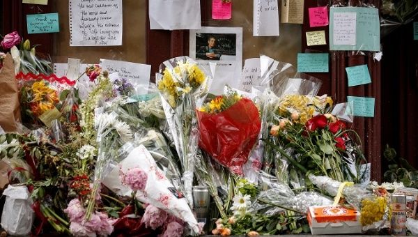 Tributes to chef and television personality Anthony Bourdain are placed outside Brasserie Les Halles in New York, U.S., June 11, 2018.