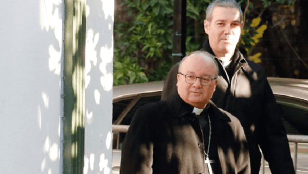 Special Vatican envoys archbishop Charles Scicluna and father Jordi Bertomeu attend a news conference in Santiago, Chile June 12, 2018