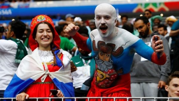 Russian fans celebrate during the opening of the World Cup.
