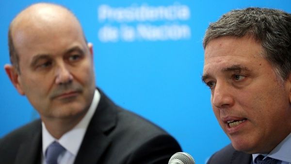 Argentina's Treasury Minister Nicolas Dujovne (R) speaks next to Argentina's Central Bank President Federico Sturzenegger, who signed Thursday's letter, talk during a news conference in Buenos Aires, Argentina, June 7, 2018.