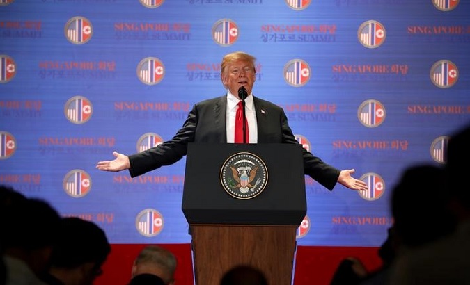 Donald Trump speaks during a news conference after his meeting with Kim Jong Un in Singapore June 12, 2018.