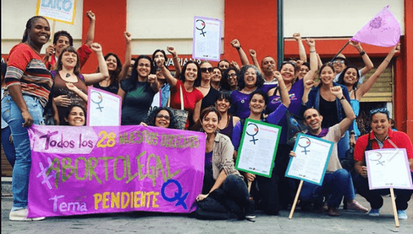 Feminist groups gathered outside the ANC in Caracas, Venezuela. 