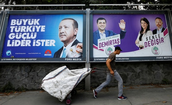 Erdoğan's poster on the left reads, 