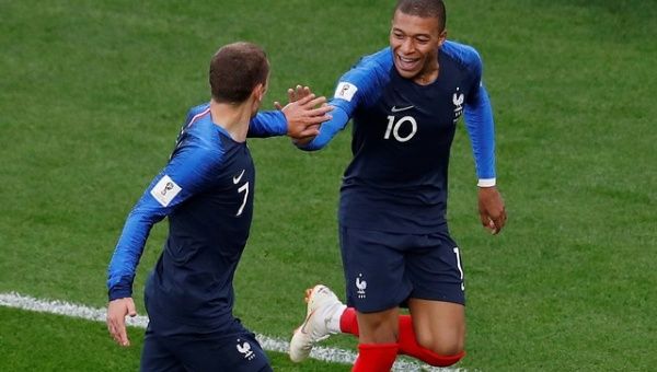 France's Kylian Mbappe celebrates scoring their first goal with Antoine Griezmann. 