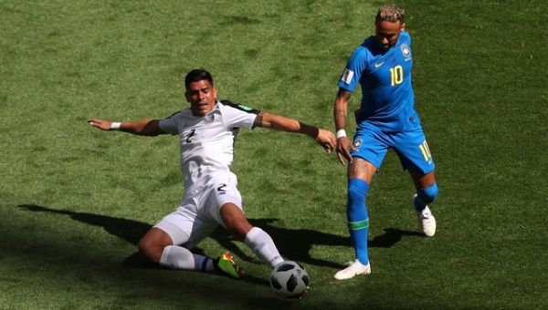 Brazil's Neymar in action with Costa Rica's Johnny Acosta.