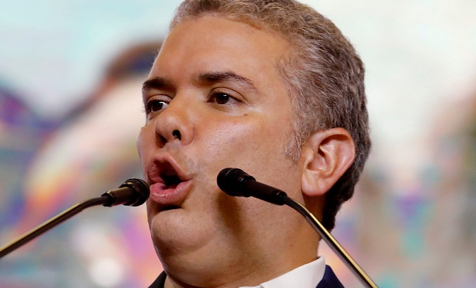Colombia's President-Elect Ivan Duque speaks to supporters after winning the presidential election in Bogota.