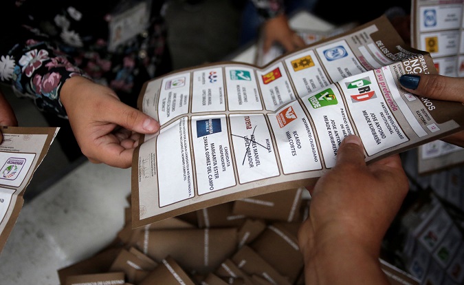 Election officials count ballots after polls closed during presidential election in Mexico City, Mexico July 1, 2018.