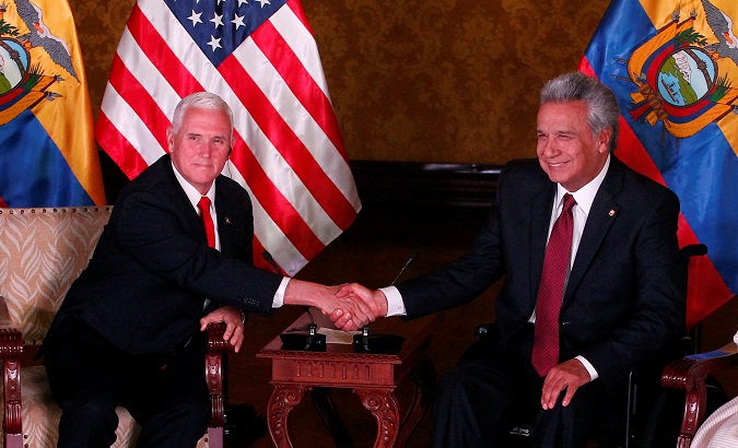 U.S. Vice-President Mike Pence shakes hands with Ecuador's President Lenin Moreno, in Quito, Ecuador June 28, 2018.