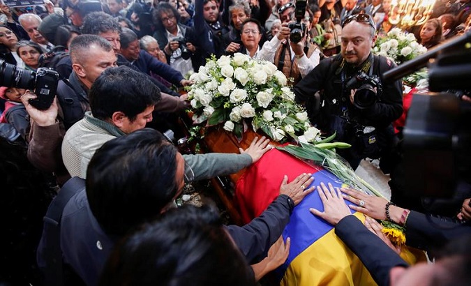 Family members and friends mourn as coffins containing the bodies of two journalists and their driver are repatriated from Colombia, in Quito, Ecuador June 29, 2018.