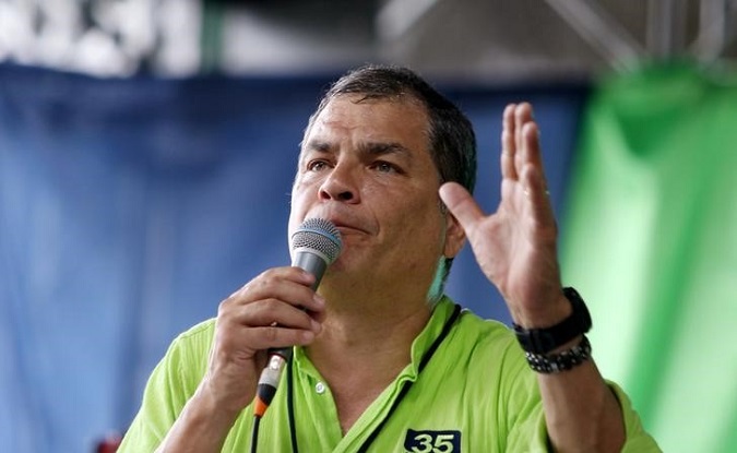 Ecuador's former President Rafael Correa addresses followers during a convention for his Alianza Pais party in Esmeraldas, Ecuador, December 3, 2017.